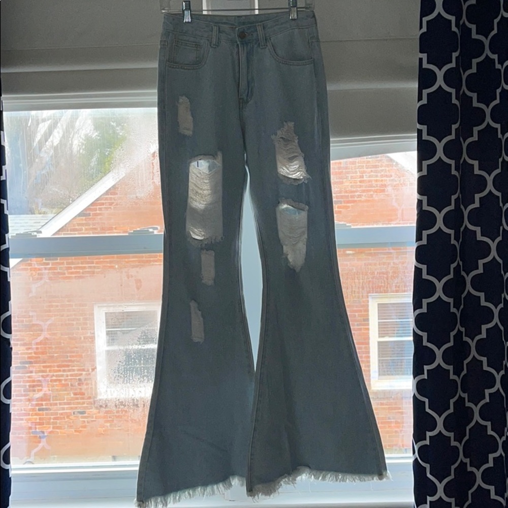 ripped flare jeans